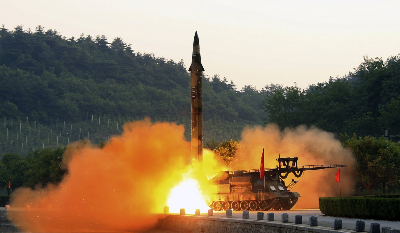 An undated photo from the North Korean Central News Agency (KCNA) shows the test-firing of a ballistic rocket equipped with precision guidance system. Photo: EPA