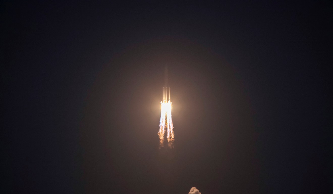 The Long March 5 rocket takes off on Sunday. An hour later, the mission was declared a failure. Photo: Reuters