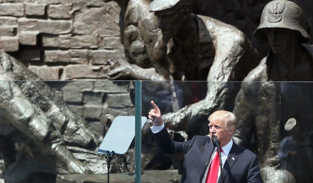 US President Donald Trump gestures as he gives a speech at Krasinski Square. Photo: EPA