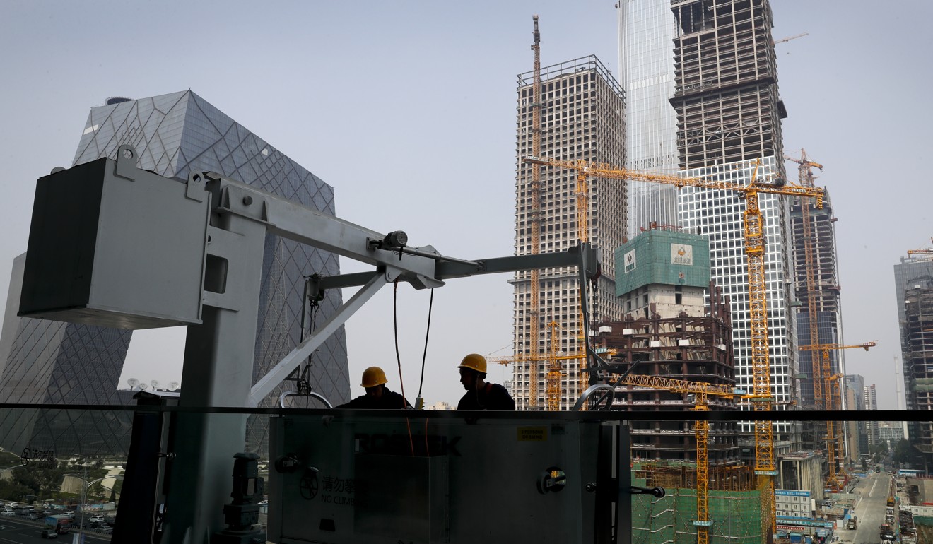 Construction works underway in Beijing’s central business district. Photo: AP