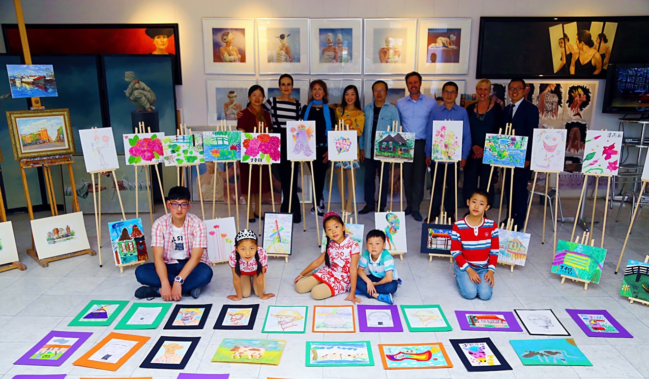Chinese youngsters display drawings they created during a study tour last August in the Netherlands at local artist Ans Markus’ art space. Photo: Handout