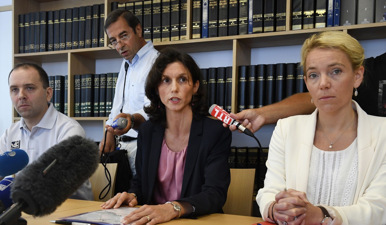 Lorient's prosecutor Laureline Peyrefitte (centre) gives a press conference along with vice-prosecutor Cecile Flamet (right) and police chief Jonathan Rey on Thursday in Lorient, where three frozen babies were discovered this week. Photo: AFP