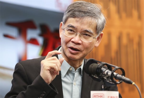 Secretary for Labour & Welfare Law Chi-kwong attends a RTHK radio programme in Kowloon Tong. Photo: SCMP / Edward Wong