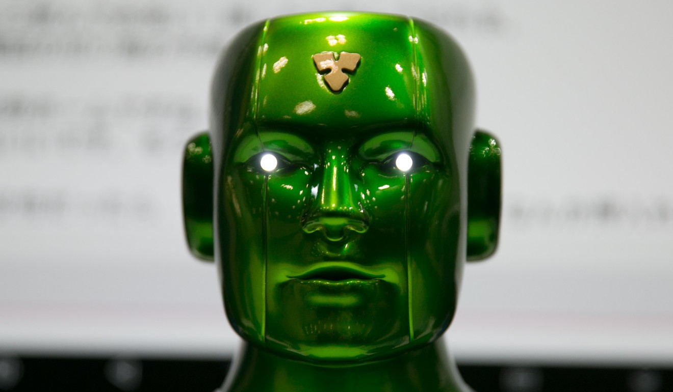 A 'Bartifical Intelligence Carlsdroid' is seen on display during the AI Expo in Tokyo on June 28. Photo: EPA