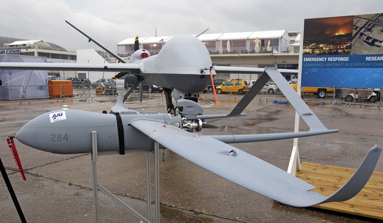 The Predator B drone by US-based General Atomics is seen behind a Textron Flight Systems drone at an airshow at Le Bourget airport, north of Paris, in this file photo from 2013. Photo: AP