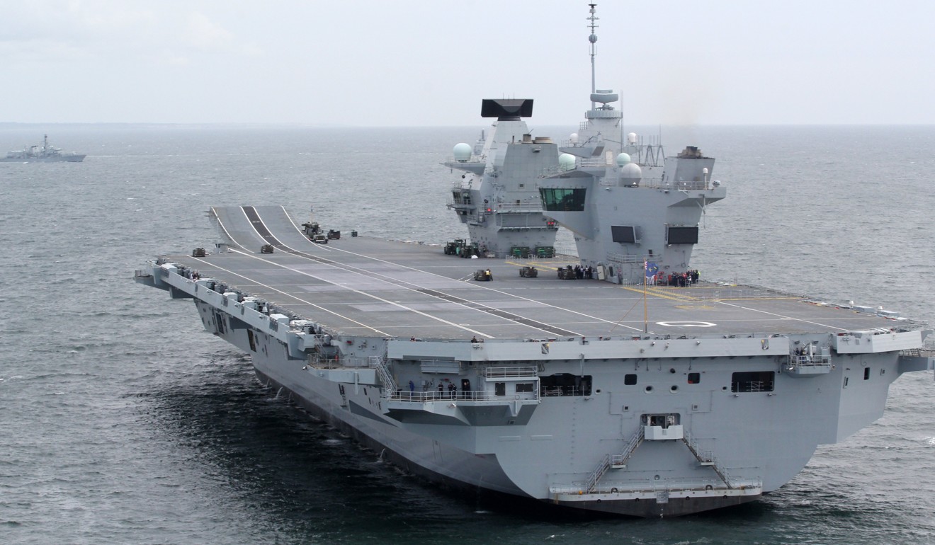 A handout photo made available by the British Ministry of Defence shows the British Royal Navy aircraft carrier, HMS Queen Elizabeth off the coast of Scotland on June 28. Photo: EPA