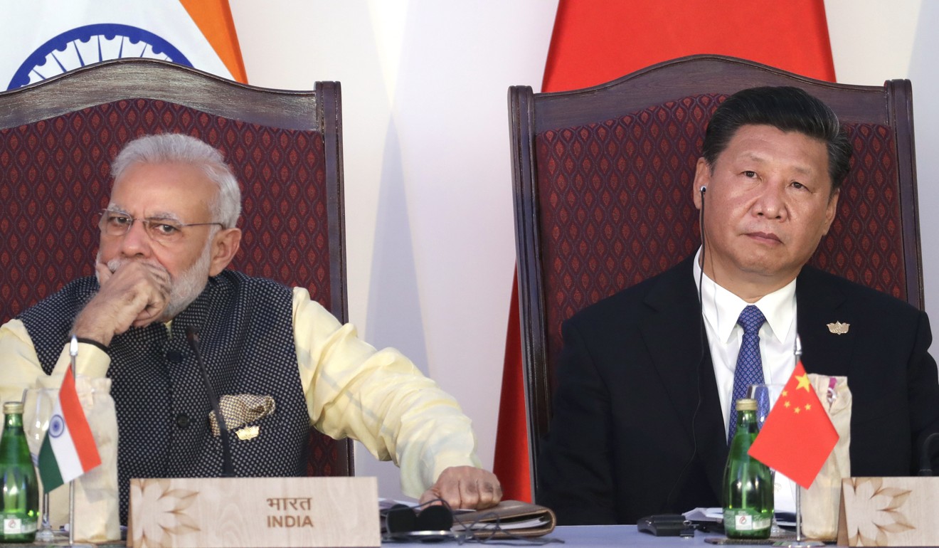 Indian Prime Minister Narendra Modi and President Xi Jinping listen to a speech during a BRICS summit in Goa last October 16. India has to carefully select a few key issues where it must confront China. Photo: AP