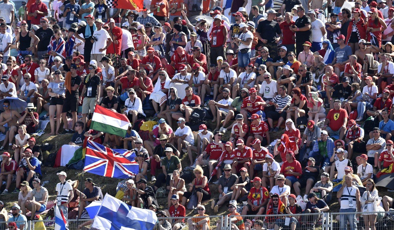 Spectators watch during the Formula One Hungarian Grand Prix on the Hungaroring circuit. Photo: EPA