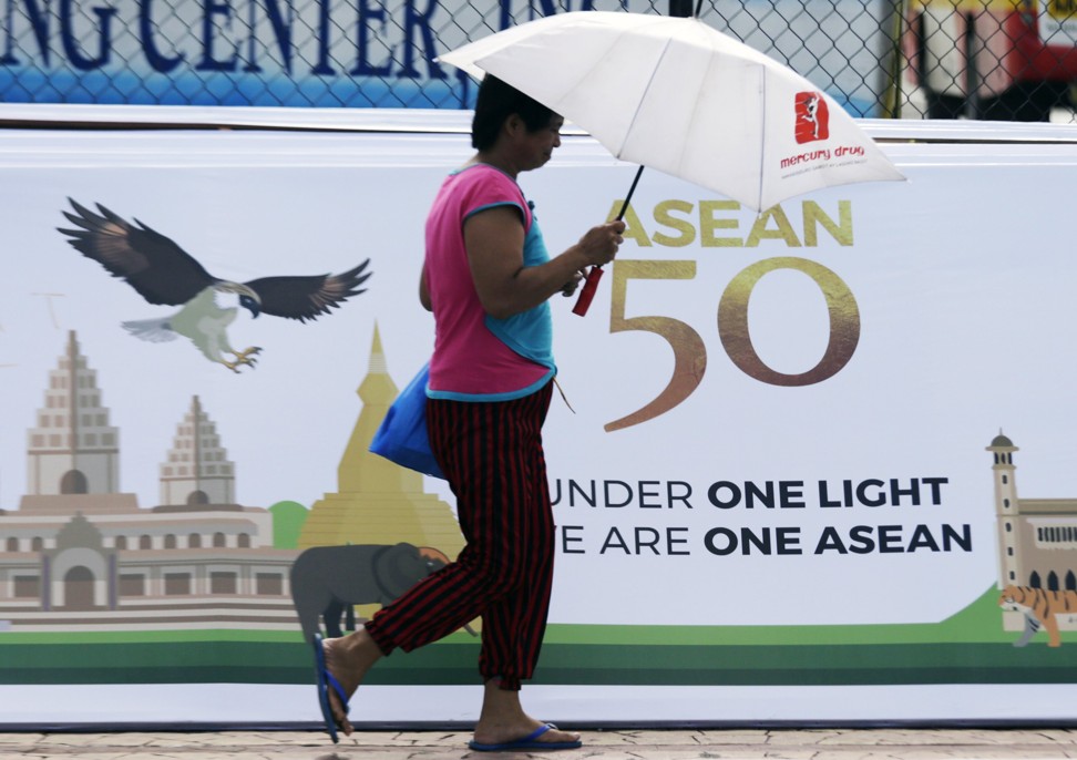 A poster marks 50 years of the Asean, in Manila on July 31. The Philippines is this year’s Asean chair. Photo: EPA