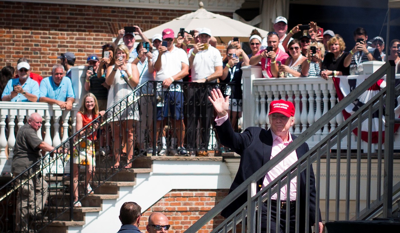 Trump waves to the crowd during the final round of the US Women's Open golf tournament at Trump National Golf Club-New Jersey in Bedminster. Photo: USA Today