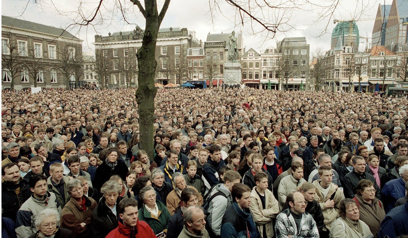 In 2001, thousands of protesters demonstrate outside Dutch government buildings at The Hague, Netherlands, as the Upper House of Parliament voted to legalise euthanasia. Photo: AP)