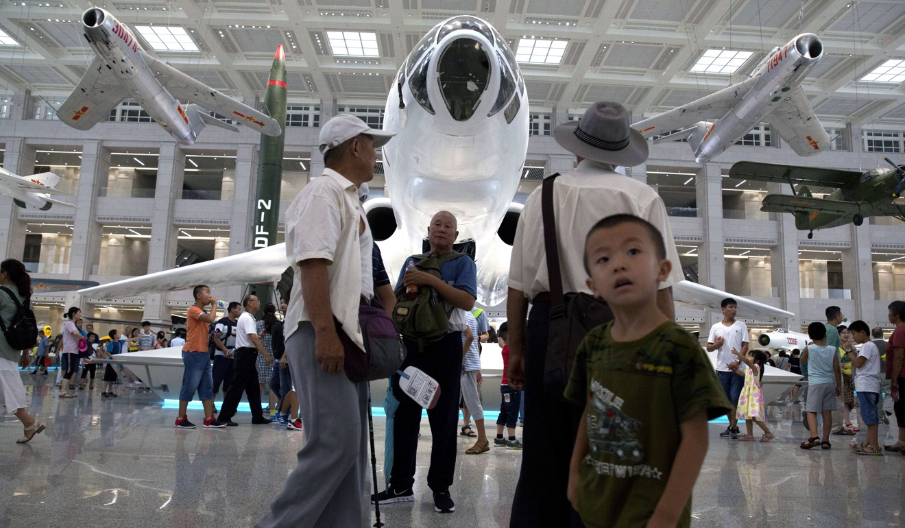 Military planes are displayed during an exhibition to mark the 90th anniversary of the founding of the People’s Liberation Army at the military museum in Beijing, China. Photo: AP