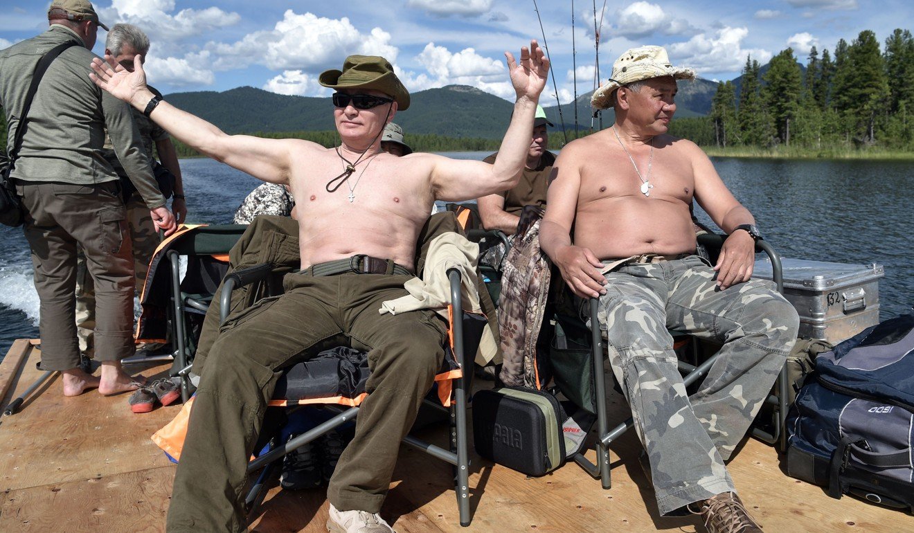 Putin fishing at the cascade of mountain lakes. Photo: EPA