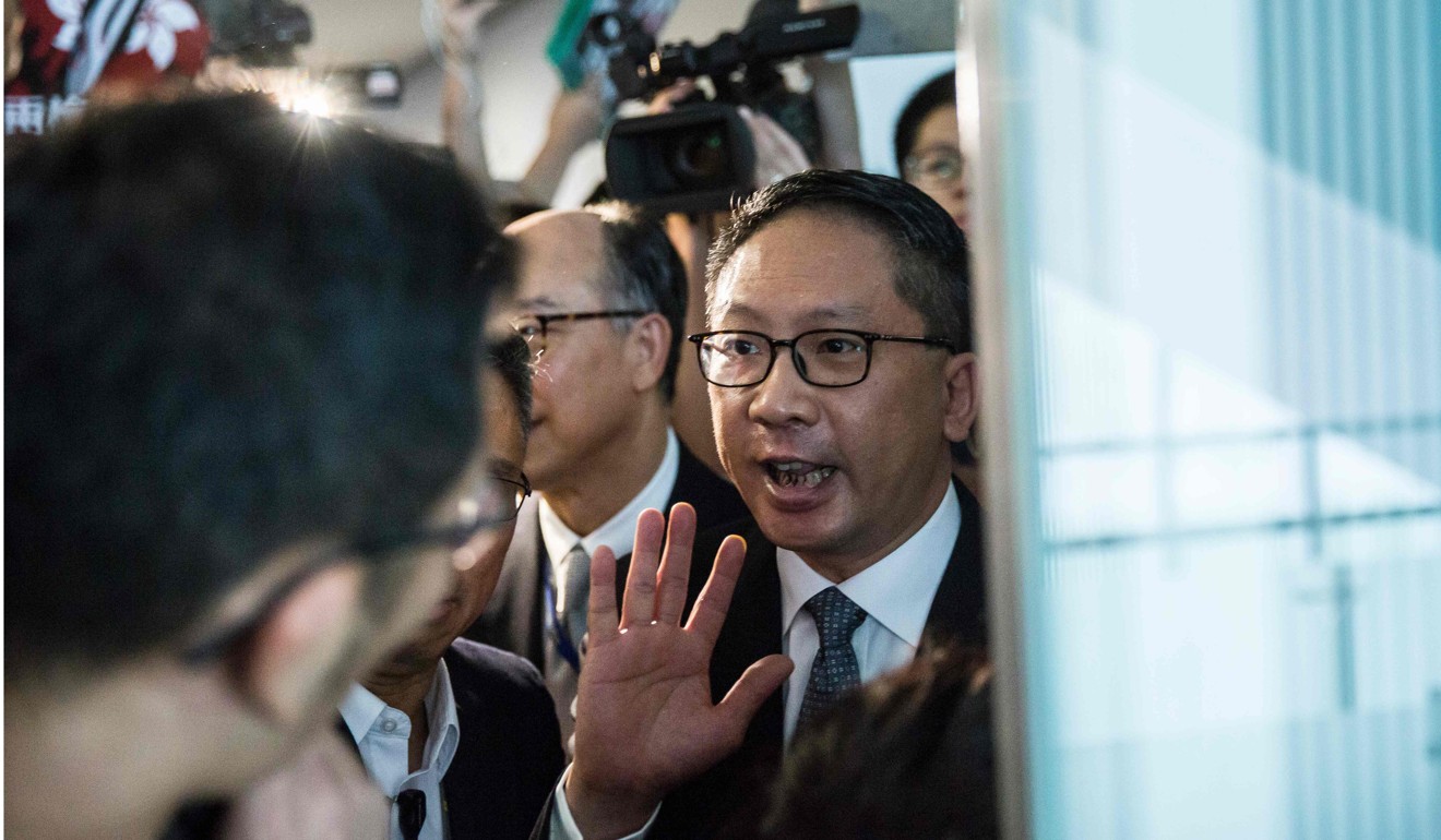 Hong Kong’s Secretary for Justice Rimsky Yuen gestures after a meeting at the Legislative Council on August 3 to discuss the high-speed rail link. The courts are expected to hear legal challenges to the joint rail checkpoint. Photo: AFP