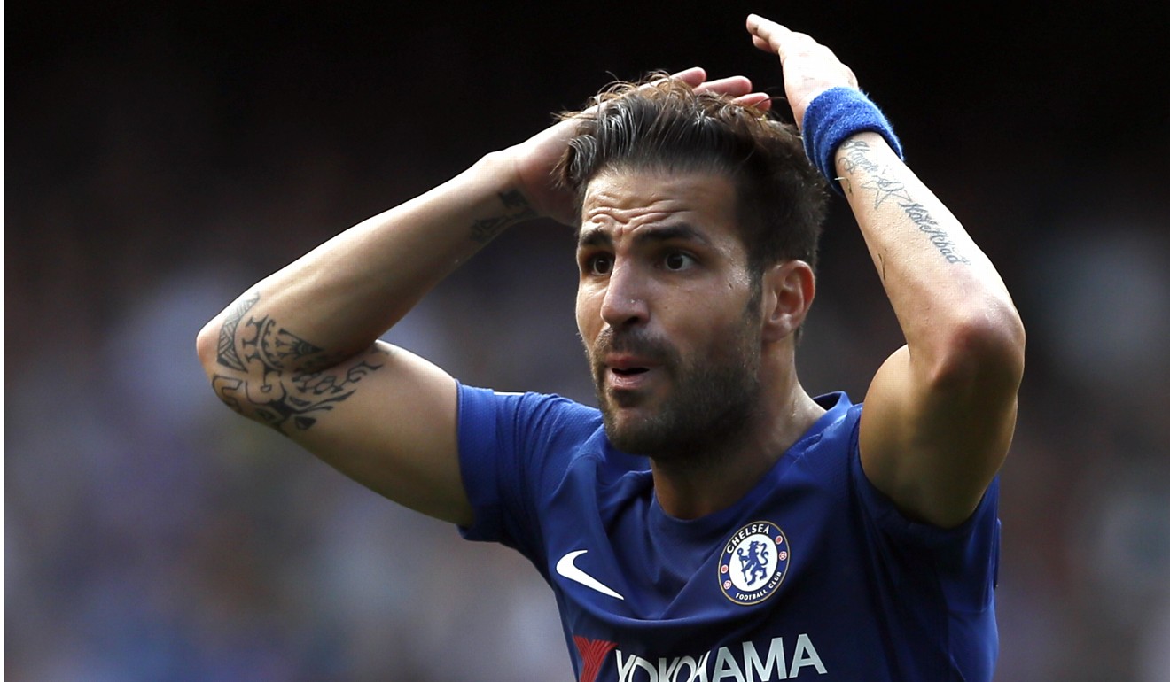 Chelsea's Cesc Fabregas reacts after getting a red card at Stamford Bridge. Photo: AP
