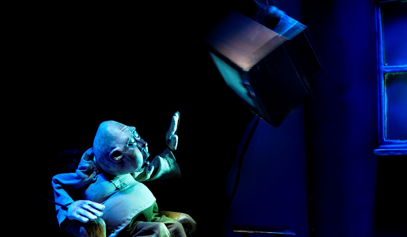 Merlin Puppet Theatre brings different puppetry techniques in <em>Clowns' Houses</em>, a story is about six residents living at five apartments in the same building, trapped with their fears, obsessions and loneliness in the prison-like dark houses.