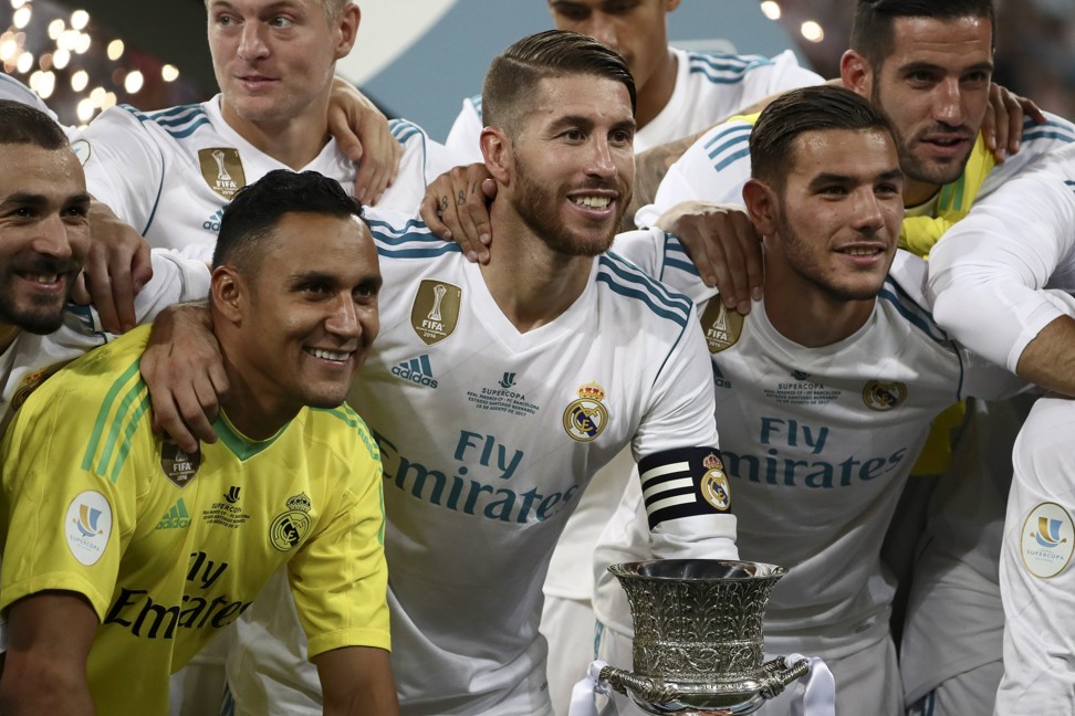 Real Madrid, sans Cristiano Ronaldo, celebrated an easy win over Barca in the Super Cup. Photo: EPA