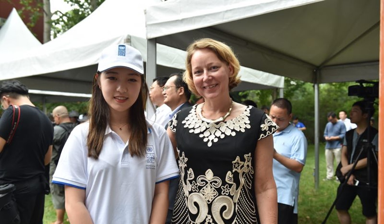 Ada Li, left, and Agi Veres, the country director of the United Nations Development Programme in China, took part in the opening ceremony of the youth leadership summer camp in Beijing. Photo: Handout