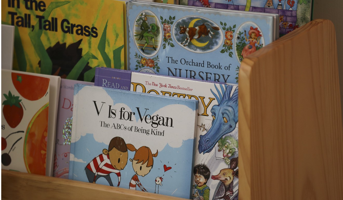 V is for Vegan, a book from parent Emily Sim’s collection for her son Henry. Photo: Nora Tam