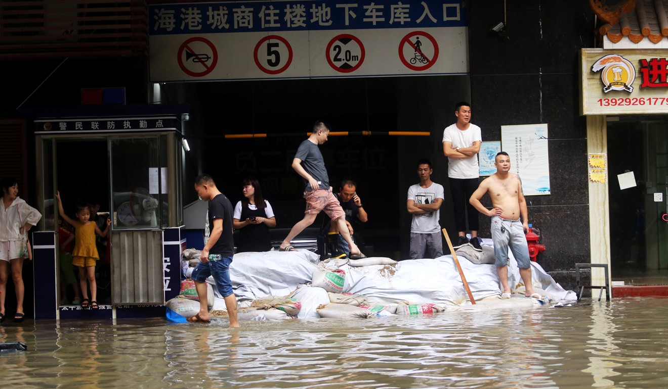 One of the four people killed in Zhuhai is thought to have drowned in a flooded garage. Photo: Reuters