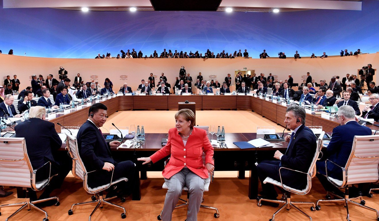 German Chancellor Angela Merkel with other world leaders including China's President Xi Jinping at the first working session of the G20 summit in Hamburg, Germany in July. File photo: Reuters