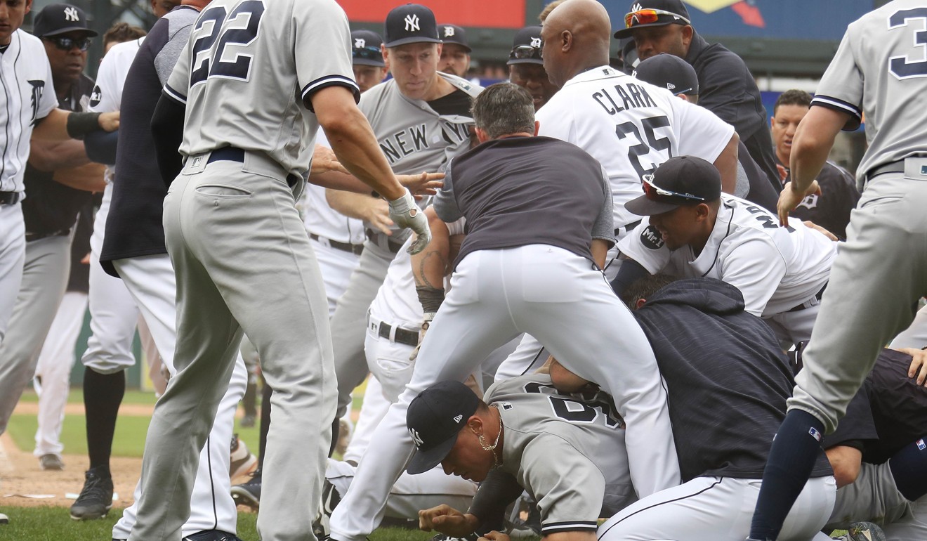 Aaron Judge #99 of the New York Yankees is on the ground during a bench clearing fight in the sixth inning against the Detroit Tigers at Comerica Park on August 24, 2017 in Detroit. Photo: AFP