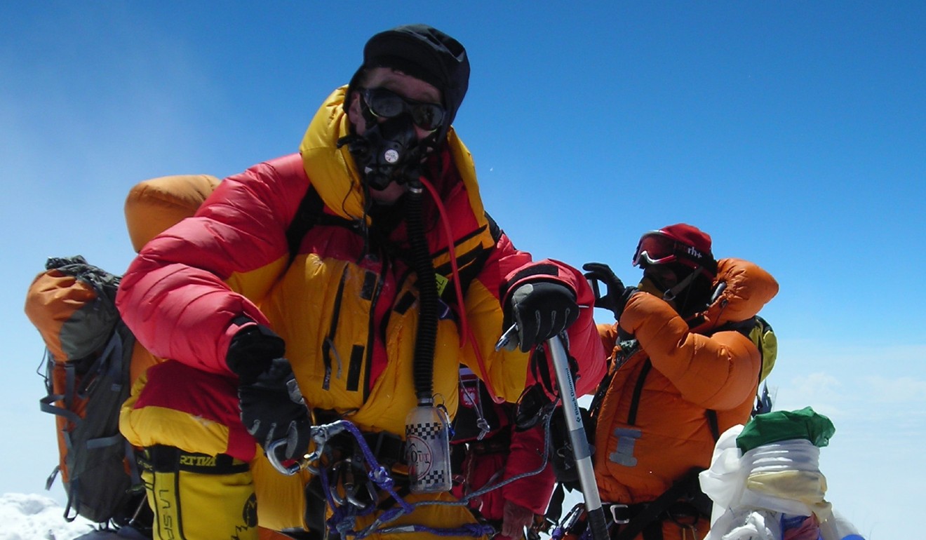 Hunter sits atop Mount Everest in 2011.