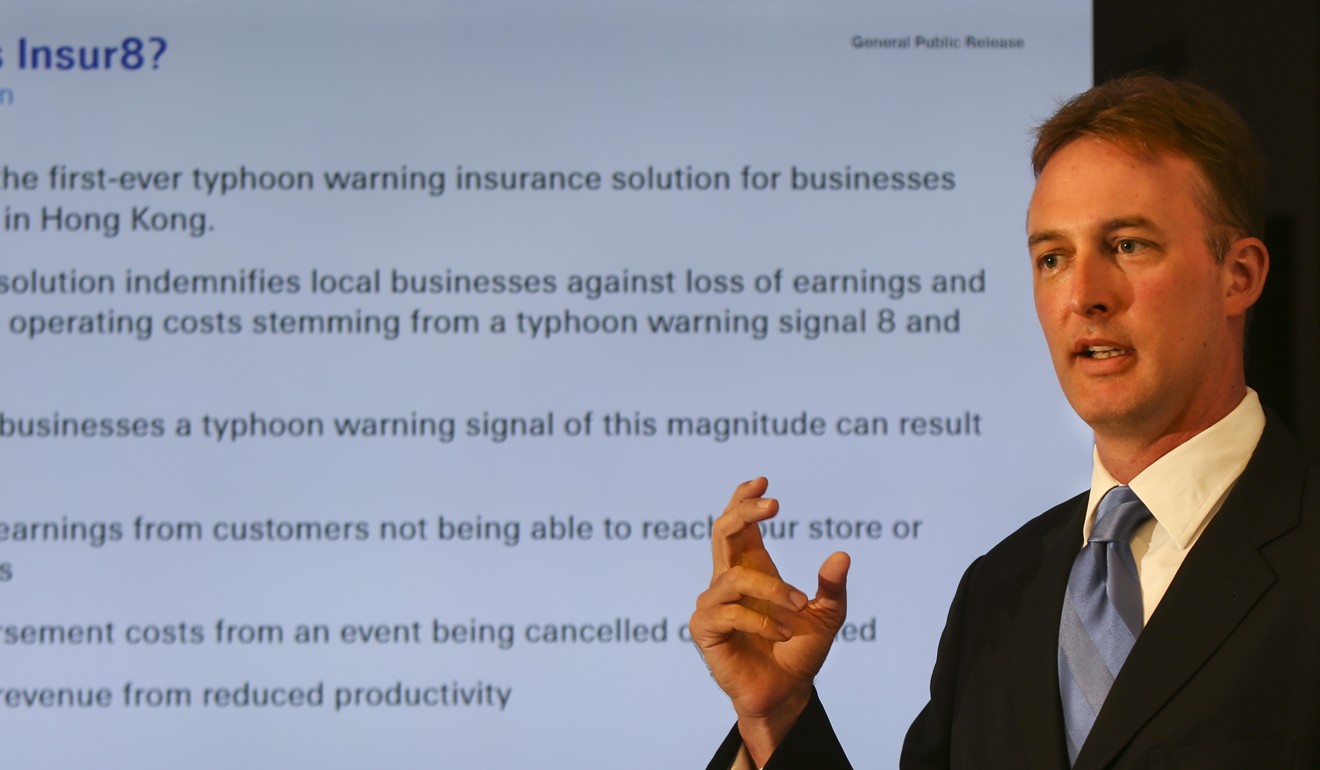 Swiss Re’s Chief Executive Director Dylan Bryant launches Insur8, which it claims is the first-ever typhoon warning insurance policy for businesses operating in Hong Kong in July. Photo: Xiaomei Chen