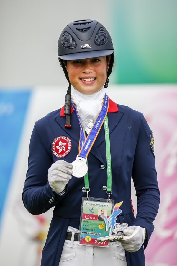 Jacqueline Siu shows off her silver in dressage.