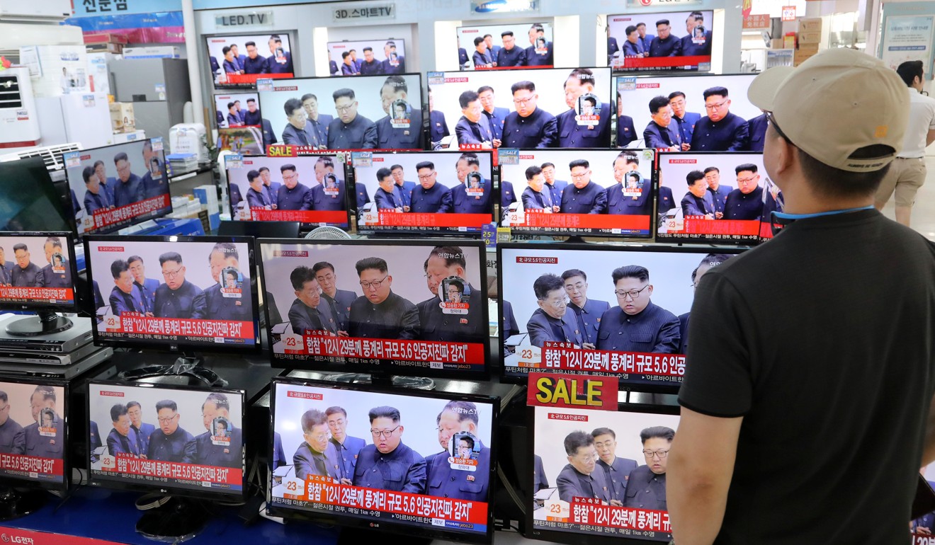 A man in an electronics shop in Seoul, South Korea watches a news report about North Korea’s latest nuclear test. Photo: Reuters