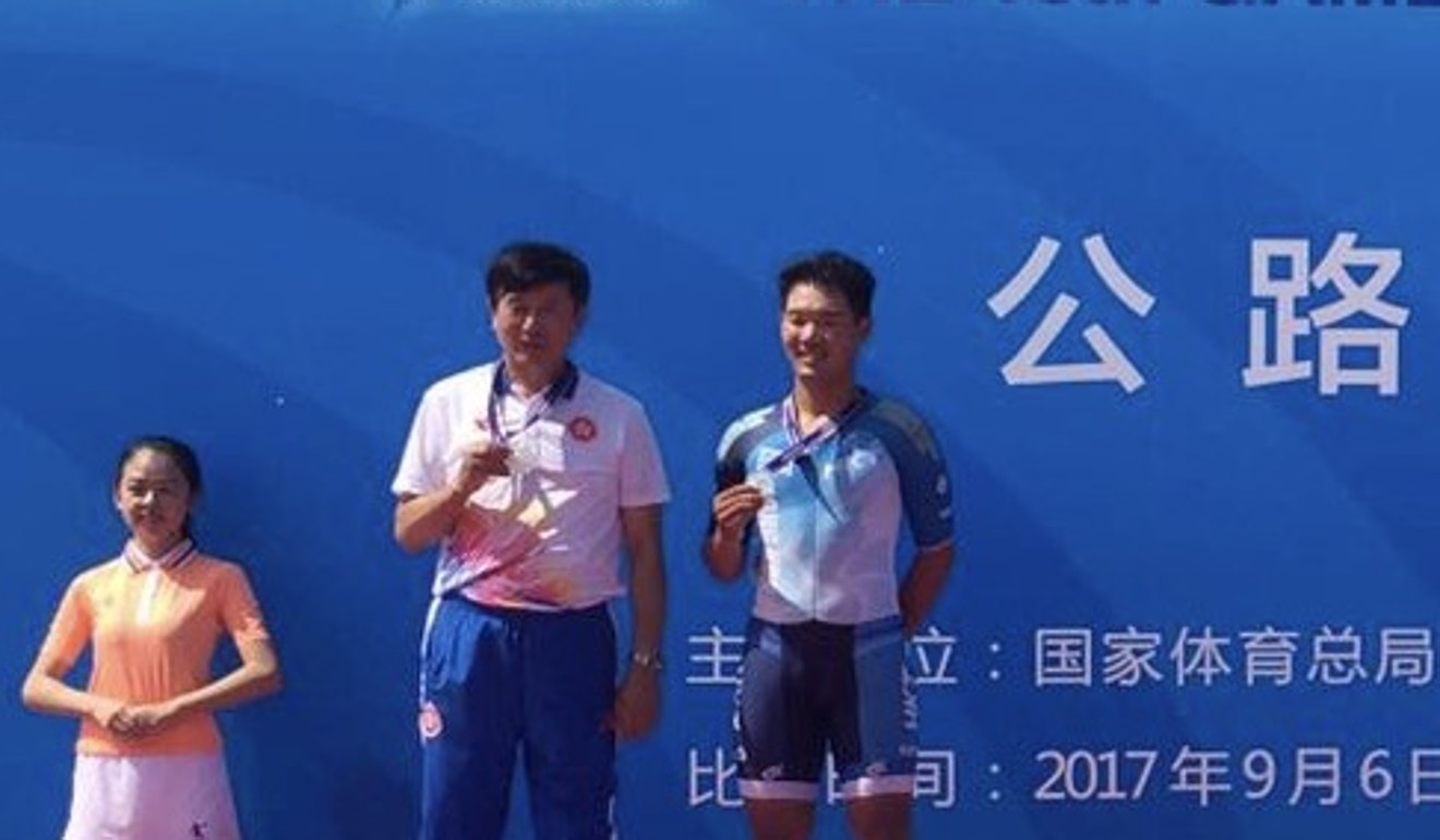 Silver medallist Cheung King-lok and coach Shen Jinkang at the prize presentation. Photo: Handout