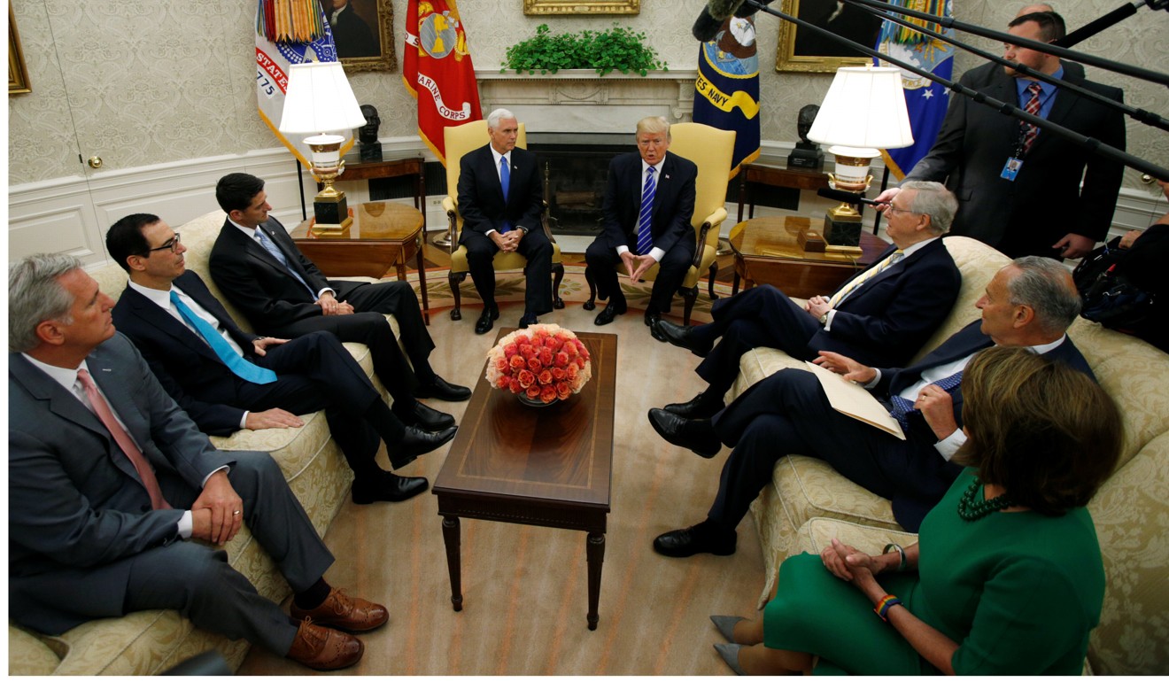 US President Donald Trump meets with congressional leaders: House Majority Leader Rep. Kevin McCarthy, Treasury Secretary Steve Mnuchin, Speaker of the House Paul Ryan, Vice President Mike Pence, Senate Majority Leader Mitch McConnell, Senate Minority Leader Chuck Schumer and House Minority Leader Nancy Pelosi in the Oval Office of the White House on Wednesday. Photo: Reuters