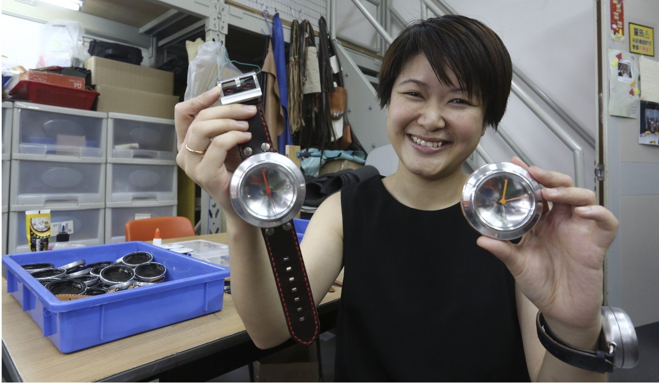 Kat Ling, founder of Alchemist Creations, with watches made out of old soft drink cans. Photo: Jonathan Wong