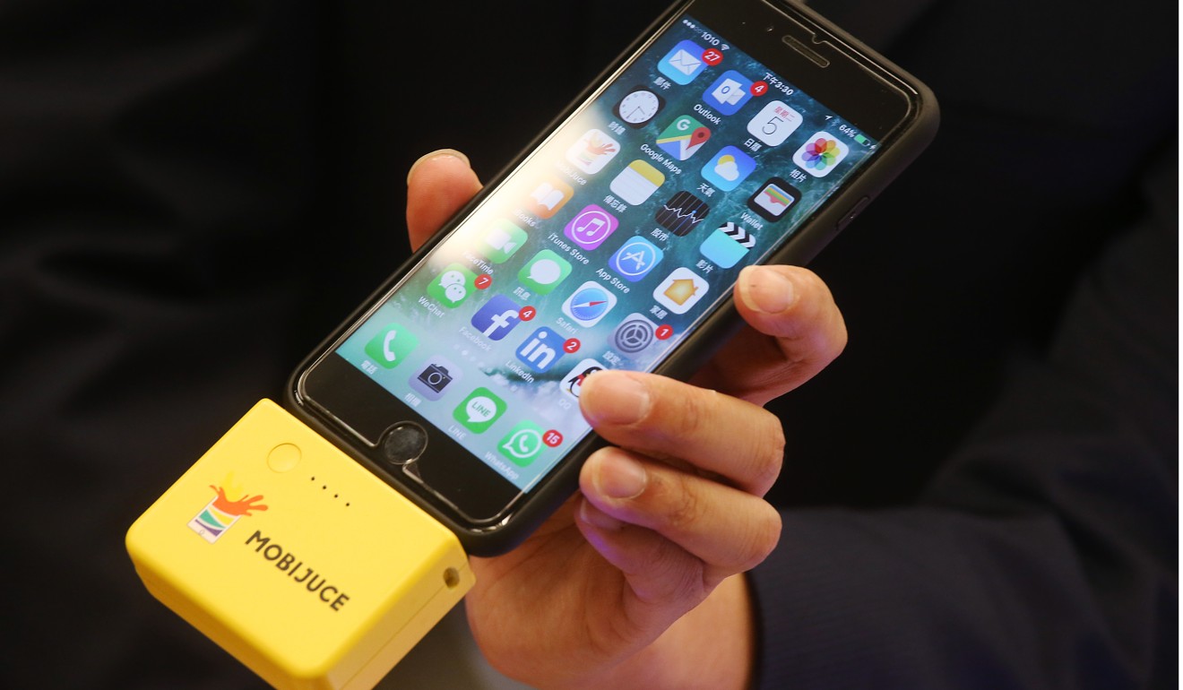 Power banks allow smartphone users to charge their devices on the go. Photo: K. Y. Cheng