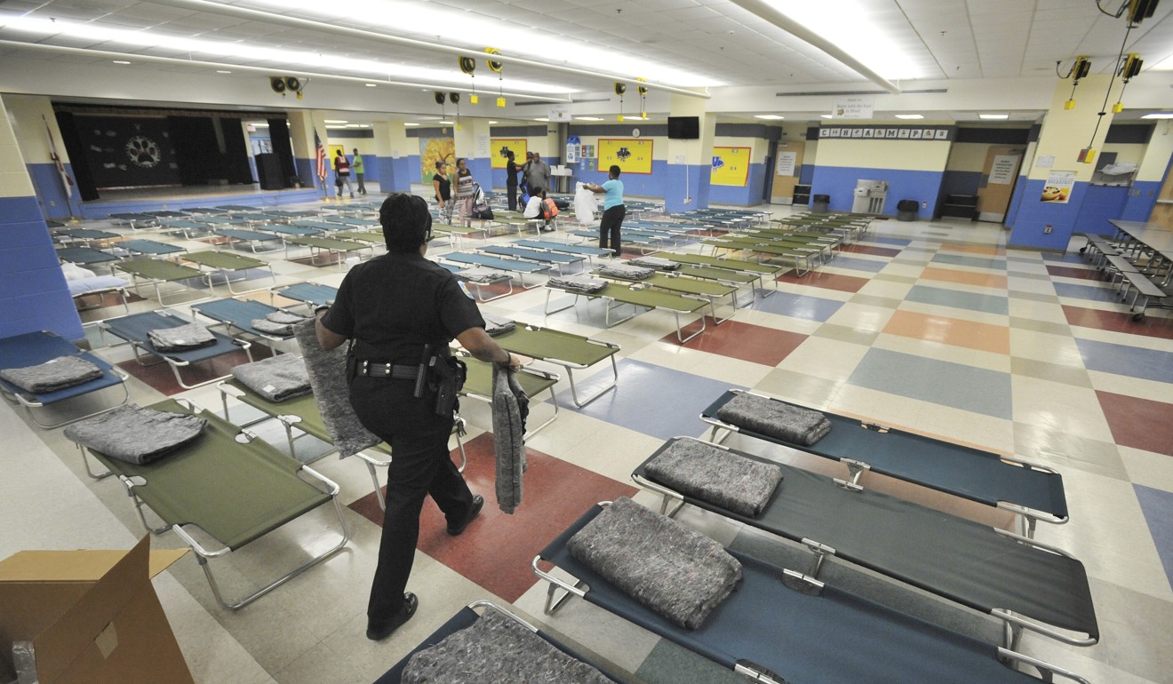Cots are set up at the Twin Lakes Elementary School's storm shelter in preparation for Hurricane Irma's impact. Photo: AP