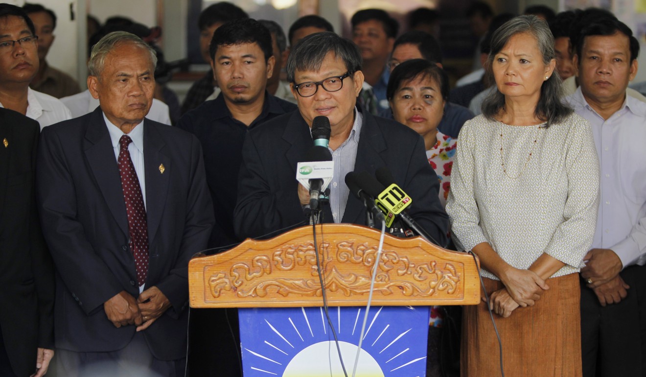 Son Chhay (C), senior member of the opposition Cambodia National Rescue Party (CNRP) gives a speech during a press conference in Phnom Penh. Photo: EPA