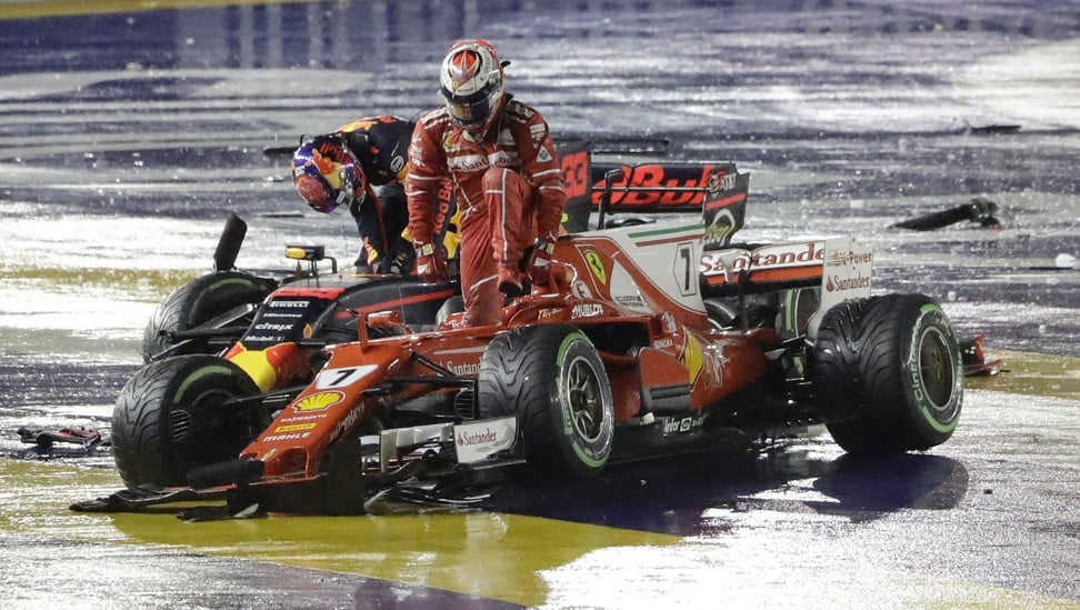 Ferrari driver Kimi Raikkonen and Red Bull driver Max Verstappen leave their cars after colliding at the start of the Singapore Grand Prix. Photo: AP