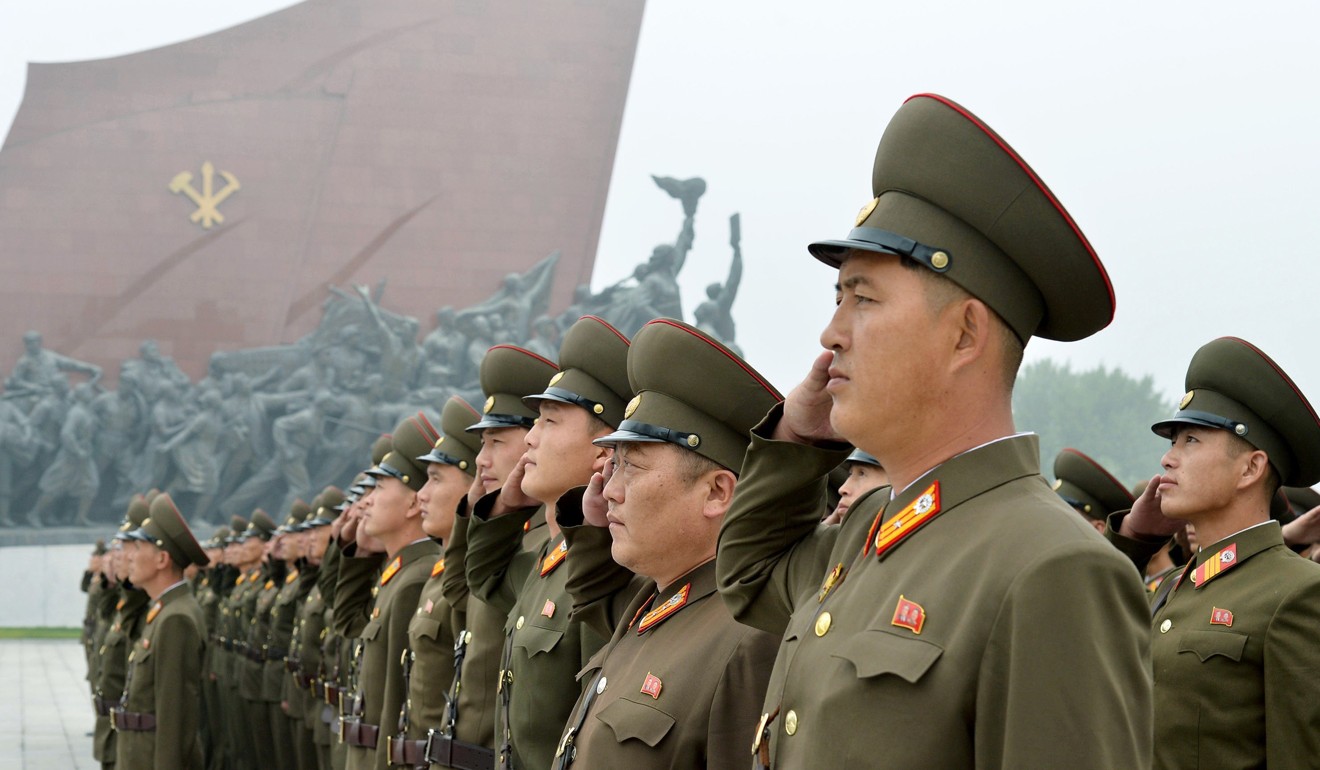 North Korean soldiers salute at Munsu Hill in Pyongyang to mark the 69th anniversary of the country's founding. Photo: Kyodo News via AP