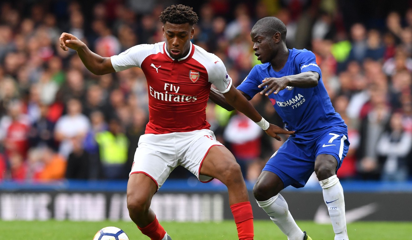 Arsenal's Nigerian striker Alex Iwobi (L) vies with Chelsea's French midfielder N'Golo Kante. Photo: AFP