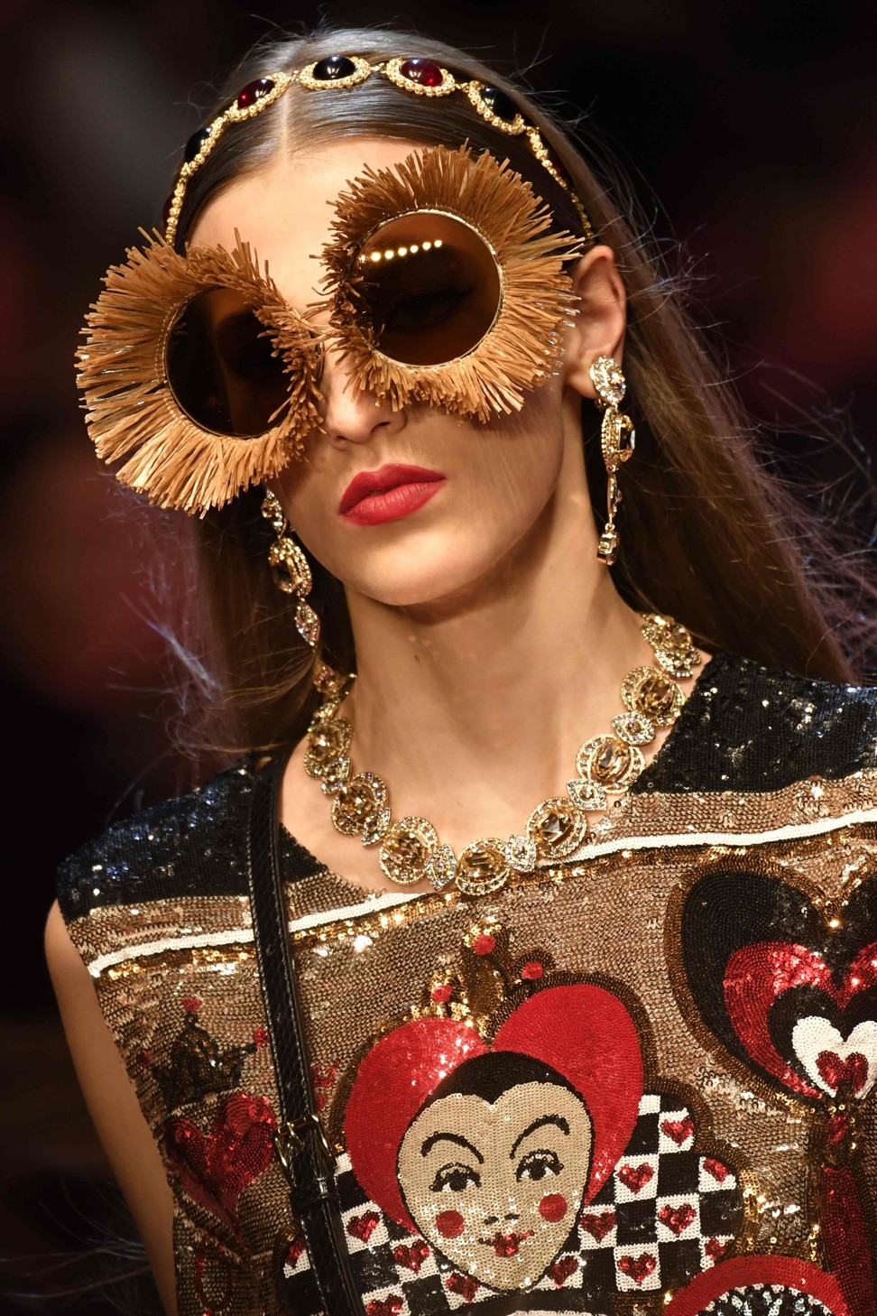 Dolce & Gabbana had fun with this collection, decking models out with regal jewels and bold accessories. Photo: AFP