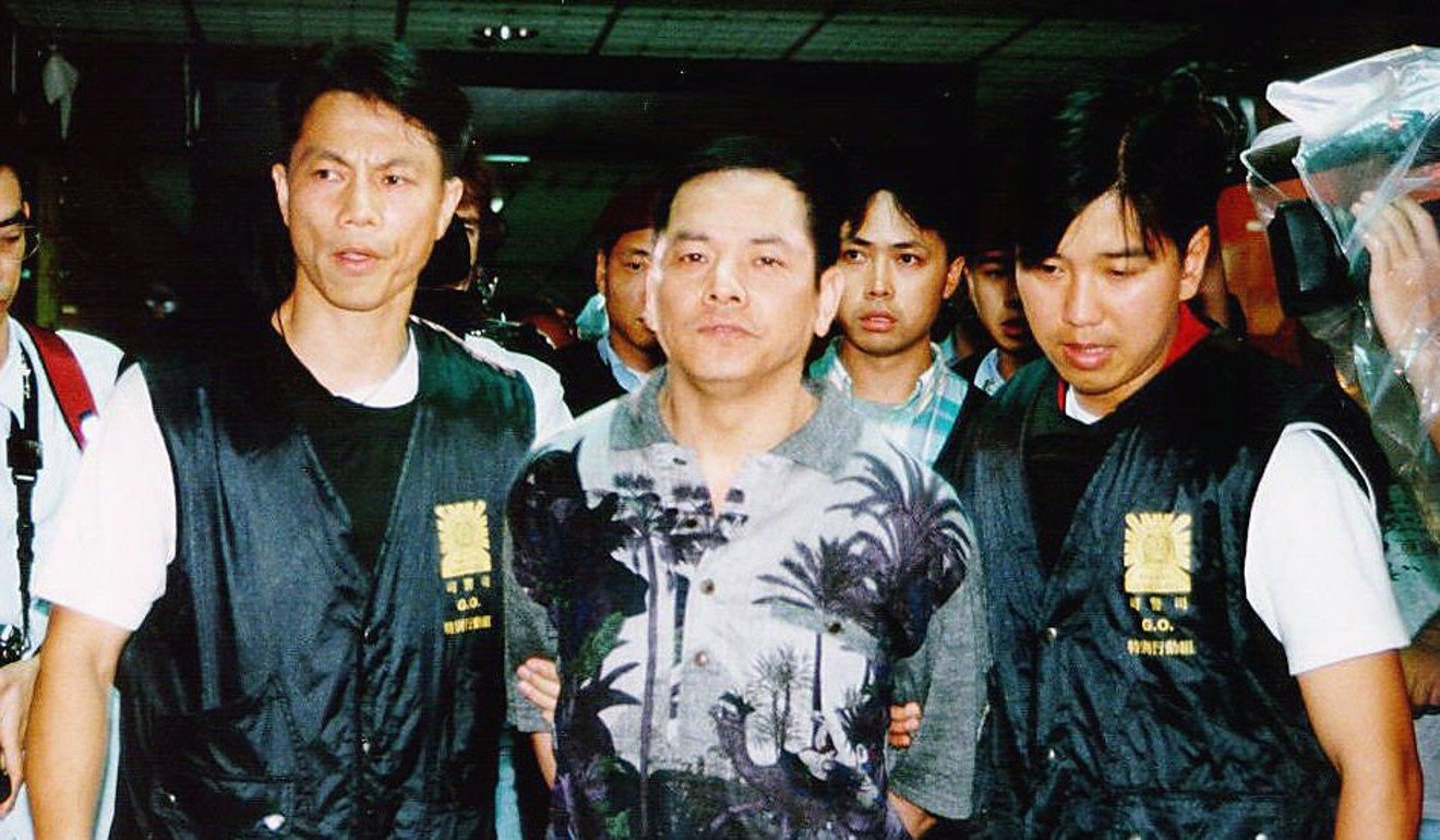 Wan Kuok-koi (middle) escorted by Macau police to court in 1998. Photo: SCMP
