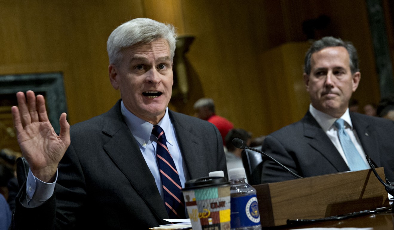 Senator Bill Cassidy, a Republican from Louisiana, left, speaks during a Senate Finance Committee hearing to consider the Graham-Cassidy-Heller-Johnson proposal in Washington to repeal ObamaCare. The law failed to get enough support and was abandoned by US Senate Republicans. Photo: Bloomberg