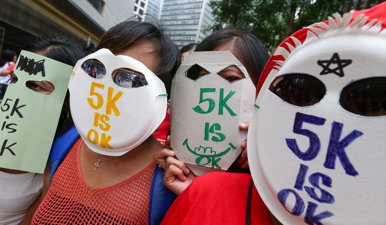 Members of Asian Migrants Coordinating Body called for higher wages for foreign domestic helpers. Photo: K.Y. Cheng