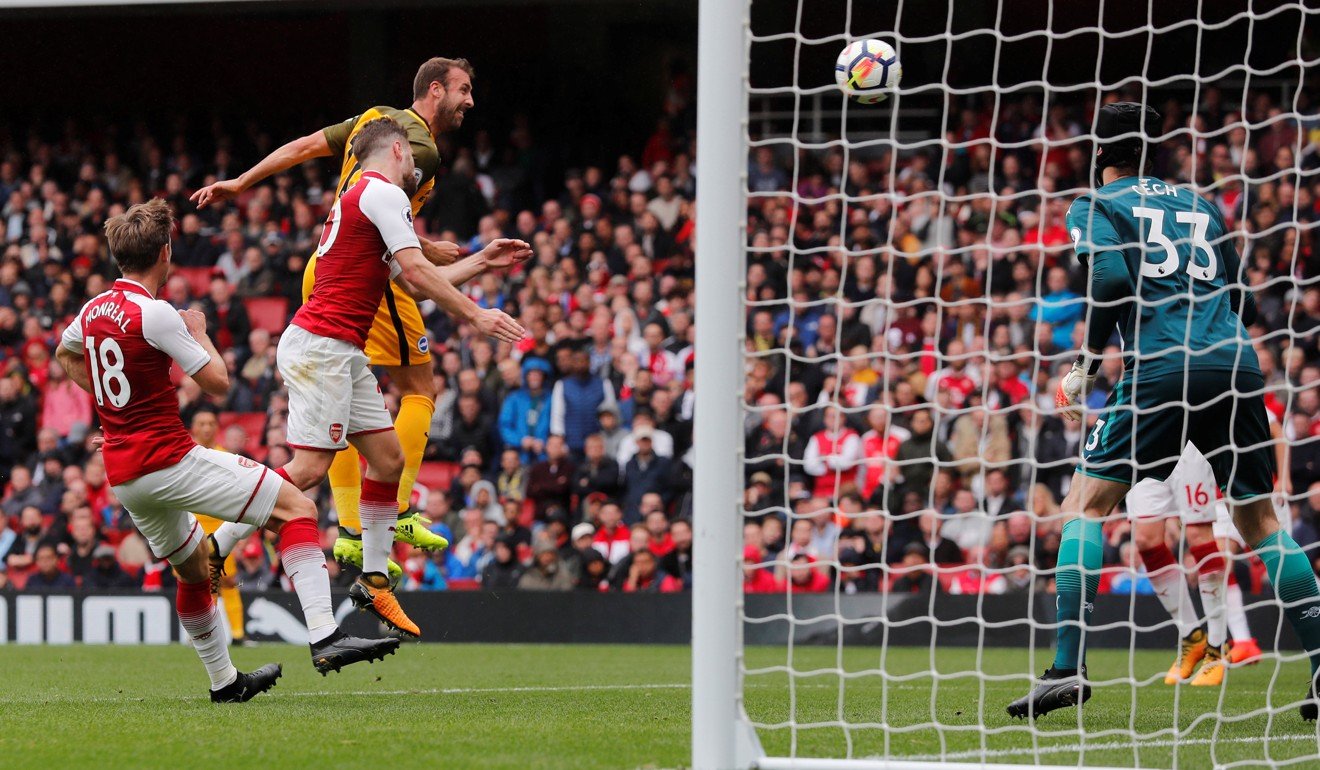 Brighton's Glenn Murray heads towards Arsenal’s goal. Photo: Reuters