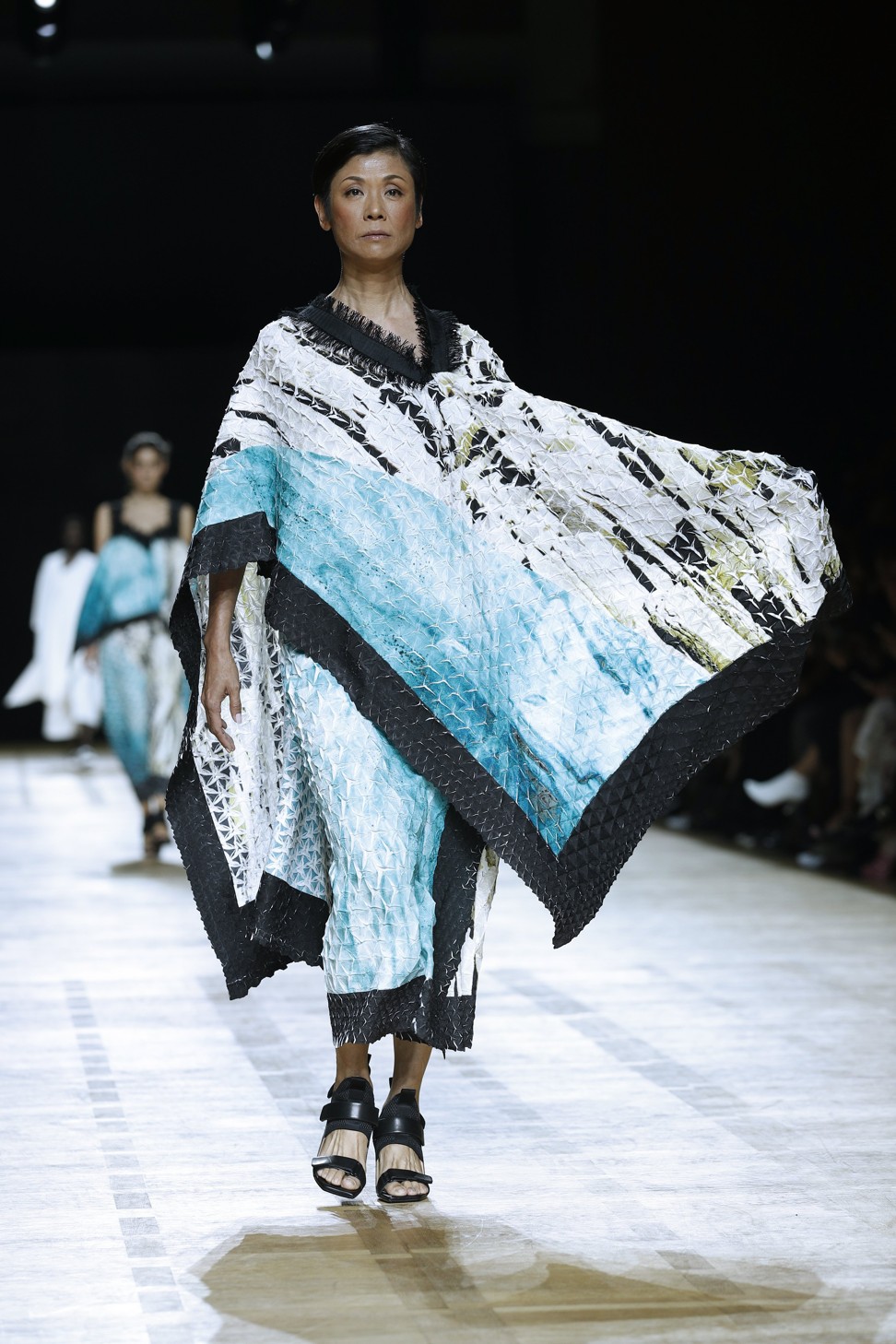 Issey Miyake’s spring-summer 2018 ready-to-wear show included three models older than 40 at Paris Fashion Week. Photo: EPA