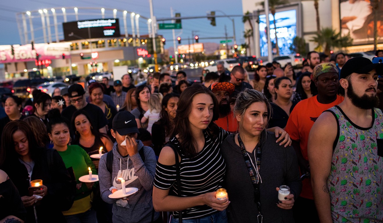 Mourners at a candlelight vigil in Las Vegas for the mass shooting victims. Photo: AFP