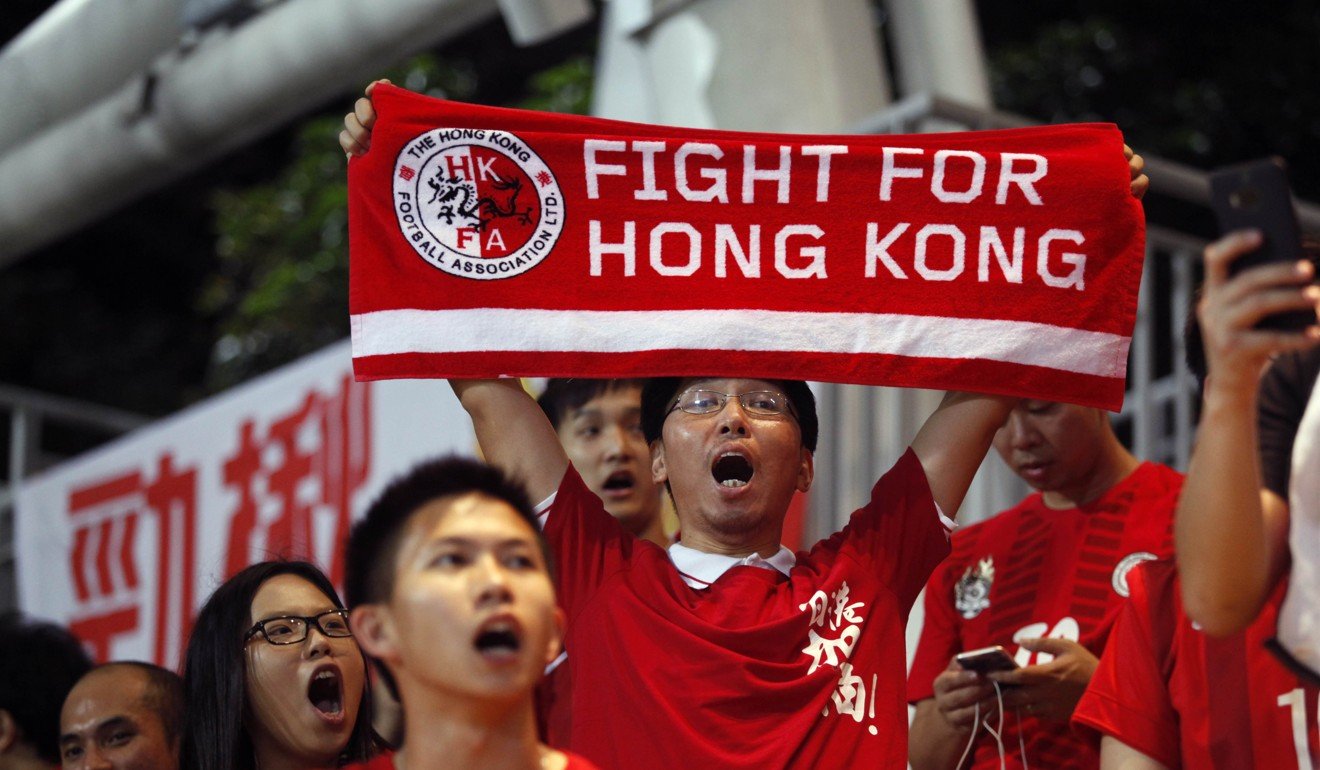 Some Hong Kong fans say they will defy the law, others say they will just support the team. Photo: AFP