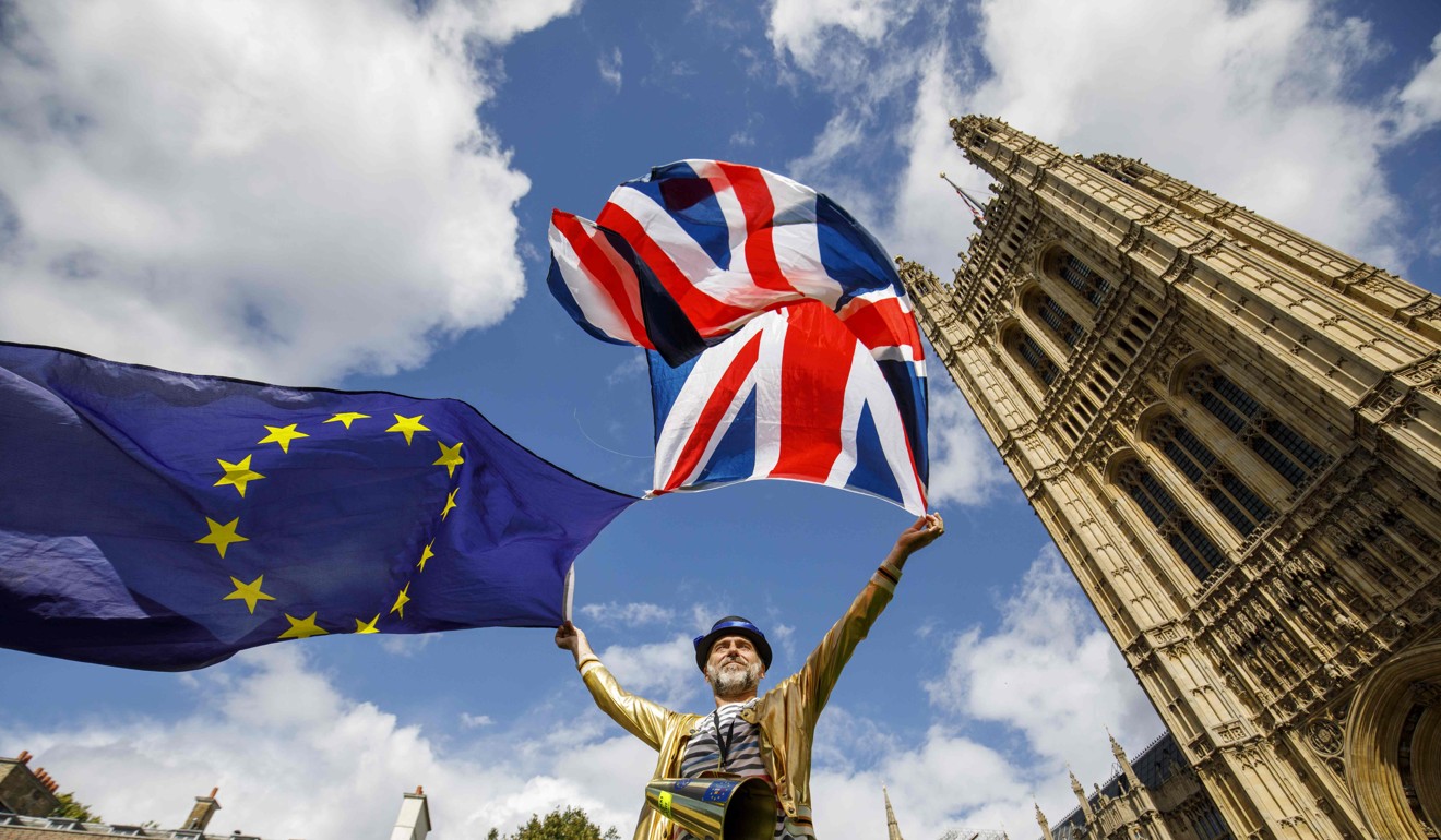 Pro-European Union demonstrators protest outside the Houses of Parliament in central London, against the first vote on a bill to end Britain’s membership of the EU, on September 11. Lawmakers approved the bill by 326 votes to 290. Photo: AFP