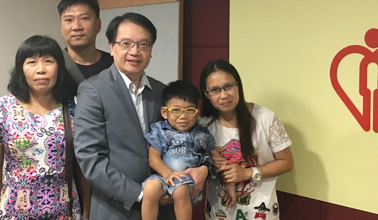 Dr Cheung Wai-lun (centre) with Hiu-chun and his mother (right) on Friday. Photo: Handout