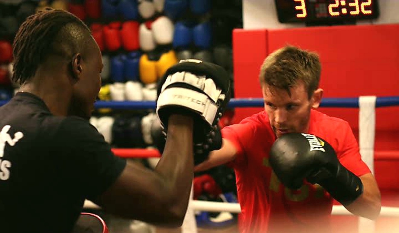Hong Kong-based British boxer Tom Taw works out.